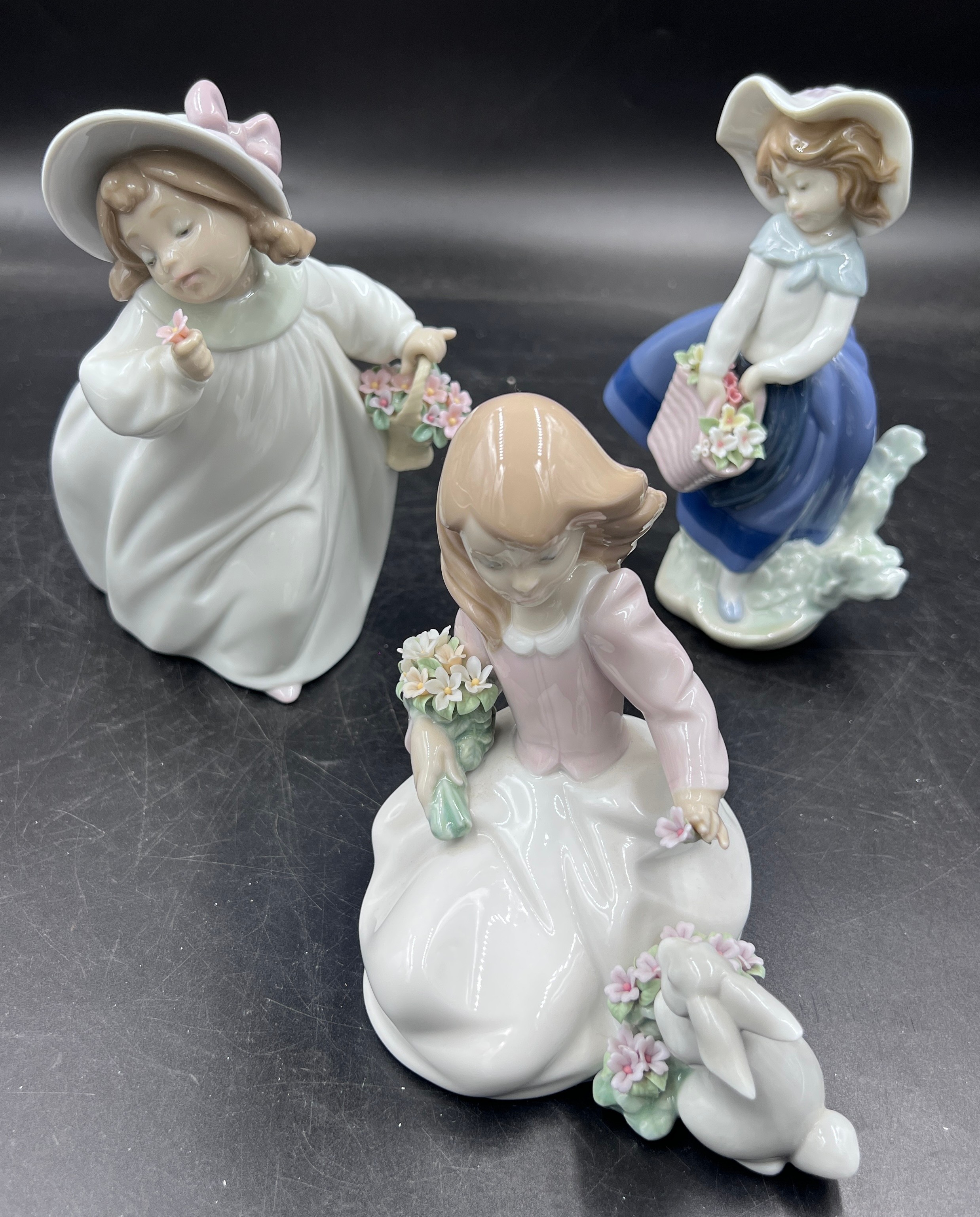 Boxed Lladro to include 5222 Pretty Pickings, 6931 Forestland Encounter and 6683 Romance.