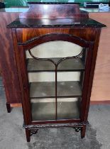 A mahogany single door display cabinet with two internal shelves. 120cm h x 61cm w x 33cm d.
