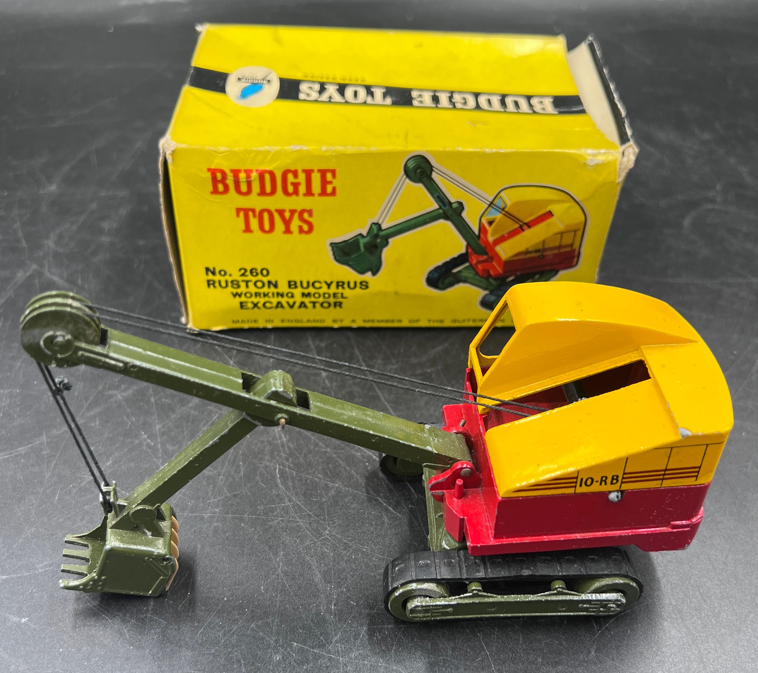 A boxed Ruston Bucyrus Working Model Excavator 10-RB. No.260. Finished in yellow and red, with