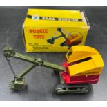 A boxed Ruston Bucyrus Working Model Excavator 10-RB. No.260. Finished in yellow and red, with