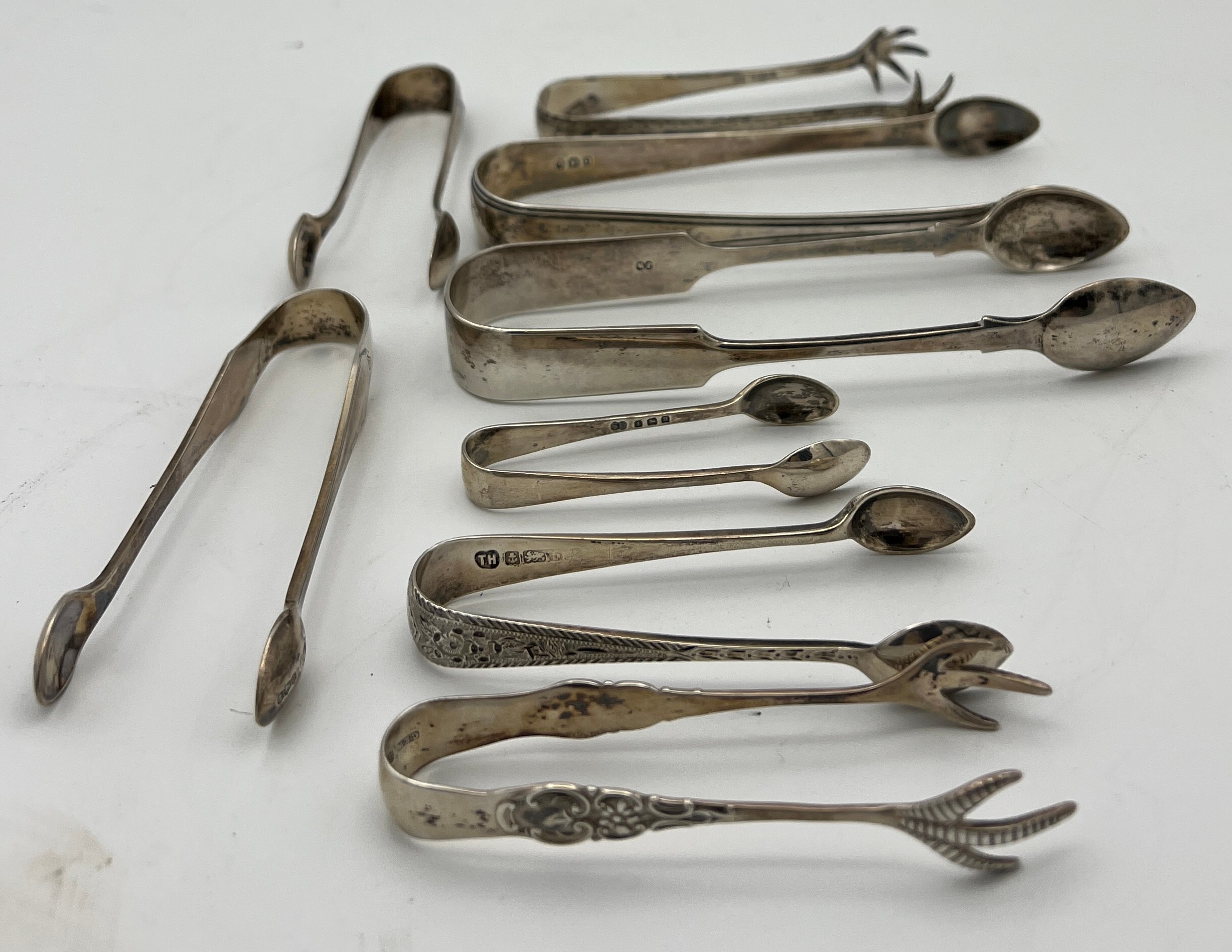 Eight hallmarked silver sugar tongs various dates and makers to include Exeter 1878, maker Josiah - Bild 3 aus 3