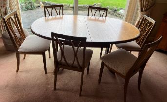 A G Plan extending dining table and 6 dining chairs, circa 1977. Extended 107cm w x 209cm l.