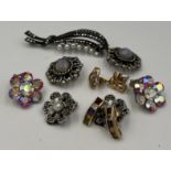 Vintage jewellery to include two pairs of gold earrings, clip on earrings and a silver and marcasite