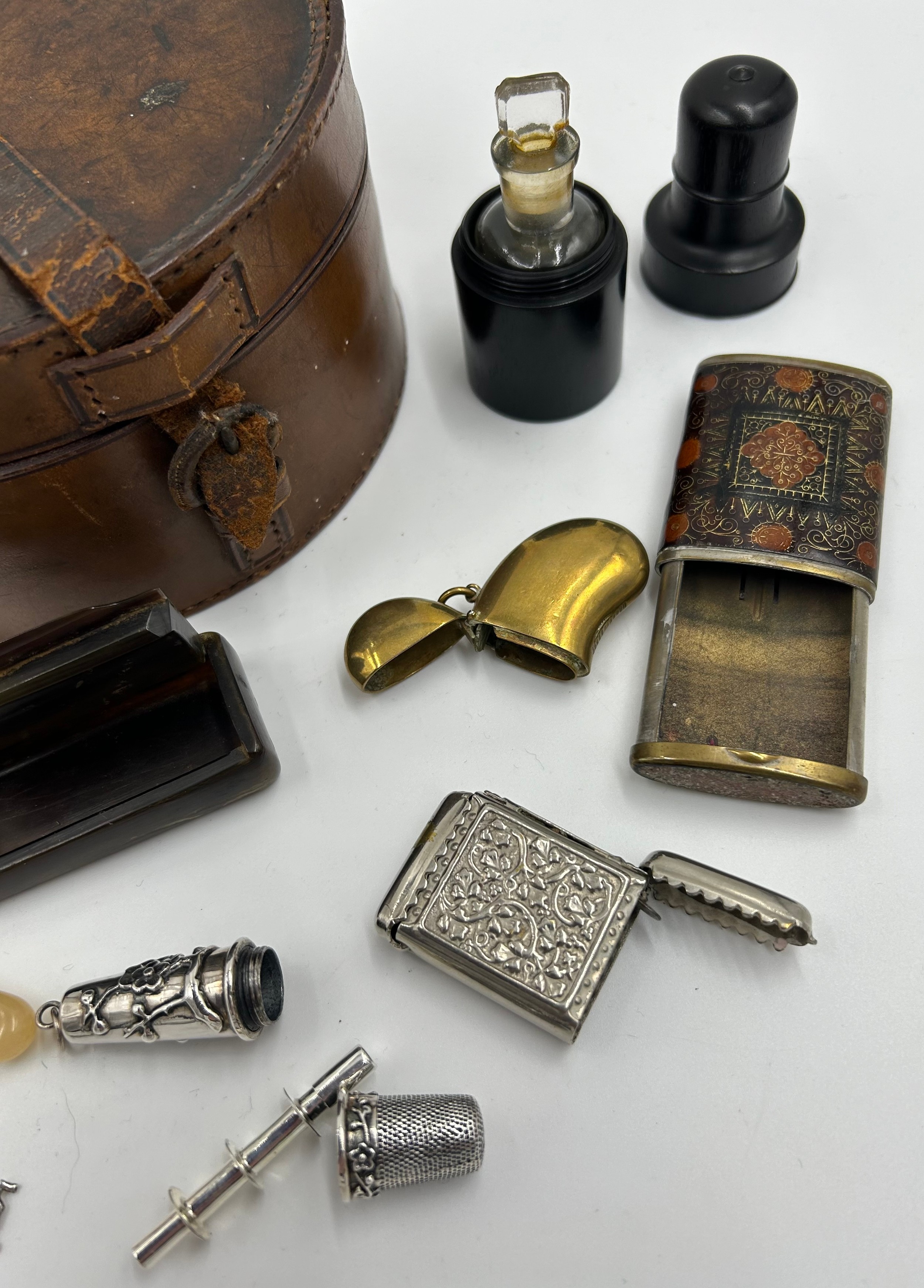 A miscellany to include : leather collar box, silver plated etui, ebony cased scent bottle, horn - Image 3 of 3