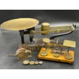 Two sets of brass postal scales to include W & T Avery inland parcel scales with sliding weight on