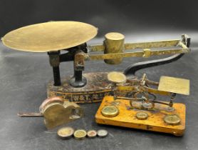 Two sets of brass postal scales to include W & T Avery inland parcel scales with sliding weight on