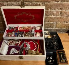 A vintage jewellery box and contents to include hallmarked silver ladies watch, silver swimming