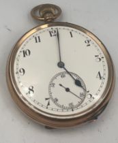 A nine carat gold cased pocket watch with subsidiary seconds dial. 5cm d. Weight 90.3gm. 158439