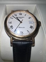 A boxed Raymond Weil automatic gentleman's wristwatch on original black leather strap. Ref: 2834,