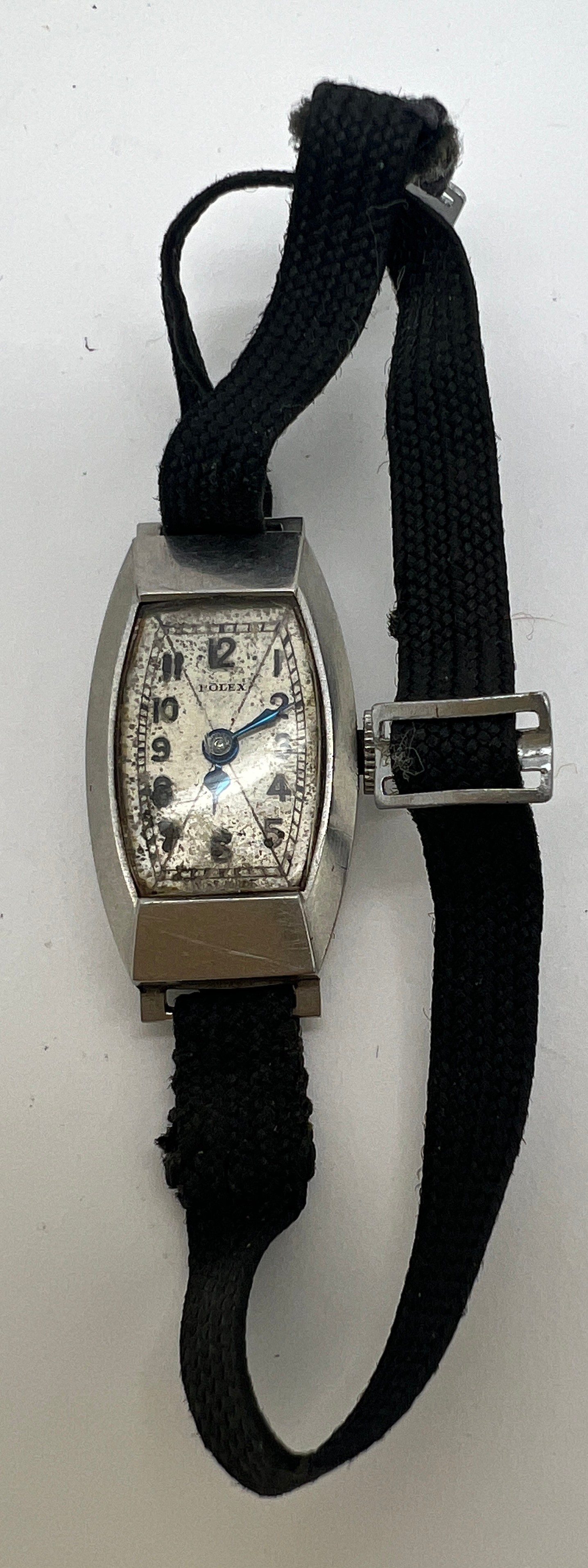 A vintage ladies Rolex wristwatch on fabric strap. 2.5cm x 1.4cm.