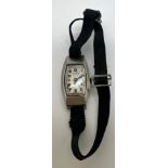 A vintage ladies Rolex wristwatch on fabric strap. 2.5cm x 1.4cm.
