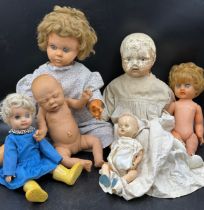 A collection of celluloid dolls, tallest 77cms long together with a Jesmar baby doll.