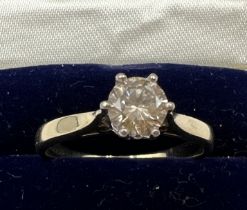 A solitaire diamond ring set in 9 carat yellow gold. Size Q. Weight 2.6gm.