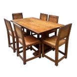 A Robert Thompson ‘Mouseman’ adzed oak dining table and six chairs given by Robert to his daughter