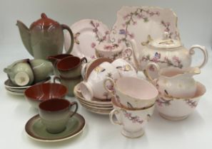 A pink Tuscan bone china tea service with blossom and butterfly pattern (teapot, milk, sugar, 6 x