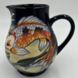 A boxed Quiet Waters Moorcroft jug, dated 2002. 15cm h.