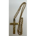 A 9 carat gold chain necklace with 9 carat gold engraved crucifix pendant. Length of chain 50cm.