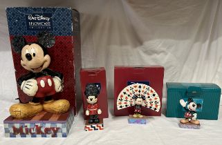 A Selection of 4 'Walt Disney Disney SHOWCASE collection figurines, boxed, to include Big Smile, Big