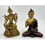 A Tibetan bronze seated figure of Green Tara 22cm h together with a heavy brass hand crafted meditat