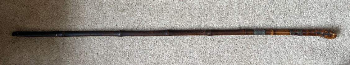A late 19thC/early 20thC bamboo sword stick, 90cm l.