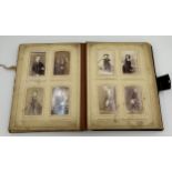 Bound photograph album with approximately 140 family portraits/social history.