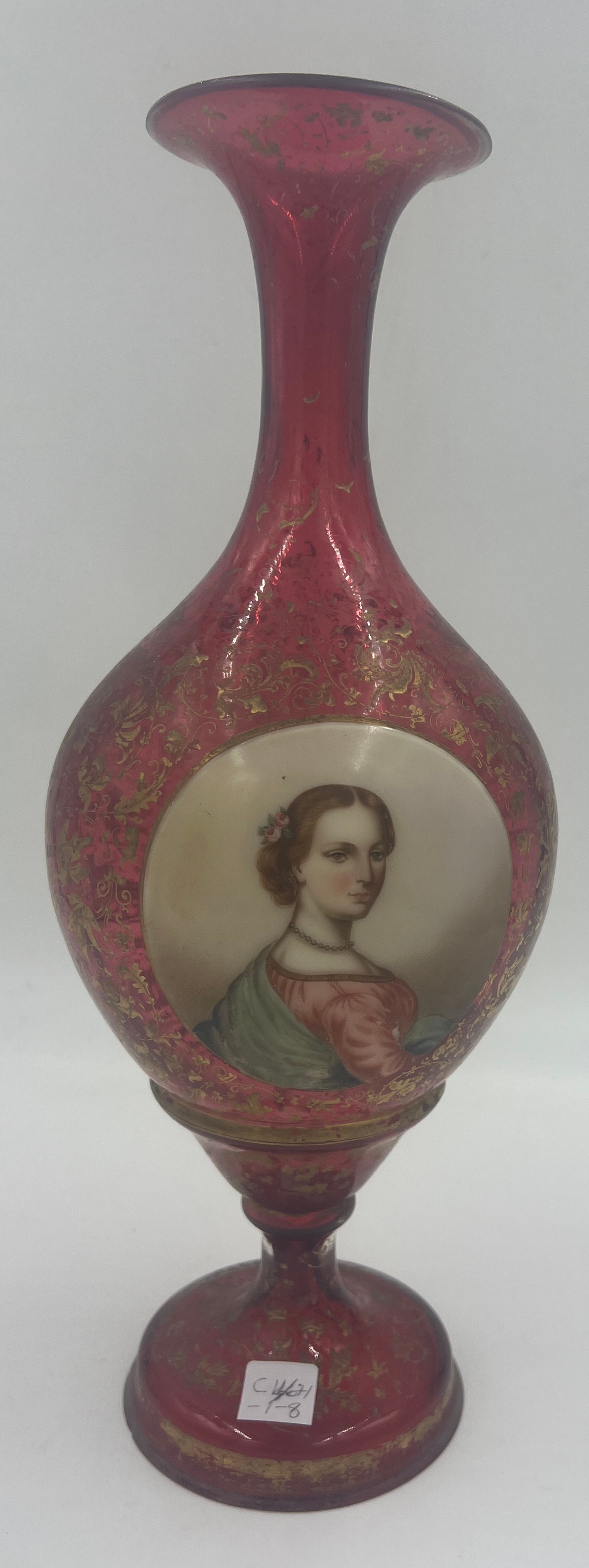 A 19thC bohemian glass vase with gilt decoration and a painted plaque to the front depicting an ele