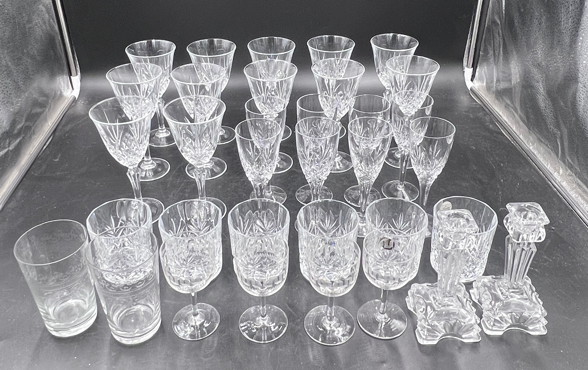 A collection of glass to include champagne flutes, wine glasses, whisky tumblers etc. approx 34