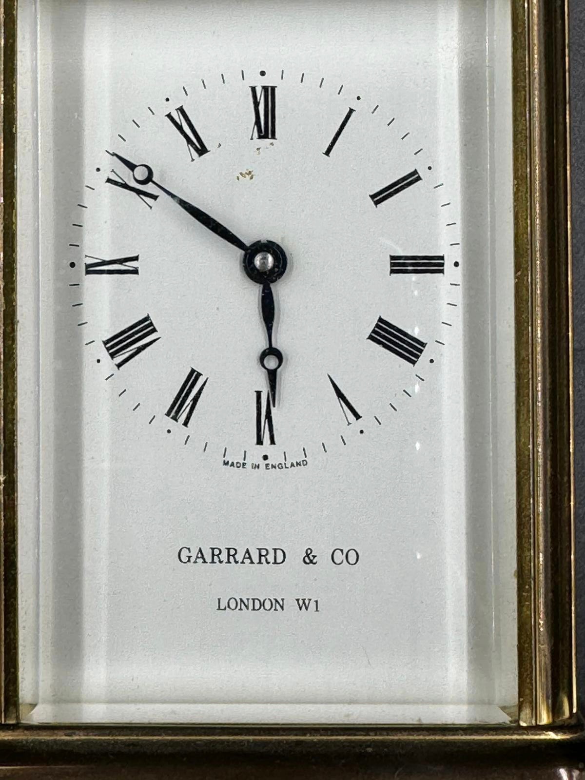 Two brass case carriage clocks to include Garrad & Co London W1 and Henley England marked to back - Image 3 of 11