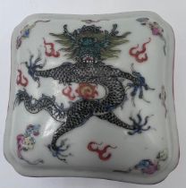 A Chinese small lidded box, flaming pearls and single five clawed dragon with red six character