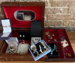 A quantity of costume jewellery to include amber, amethyst, silver etc all contained within a