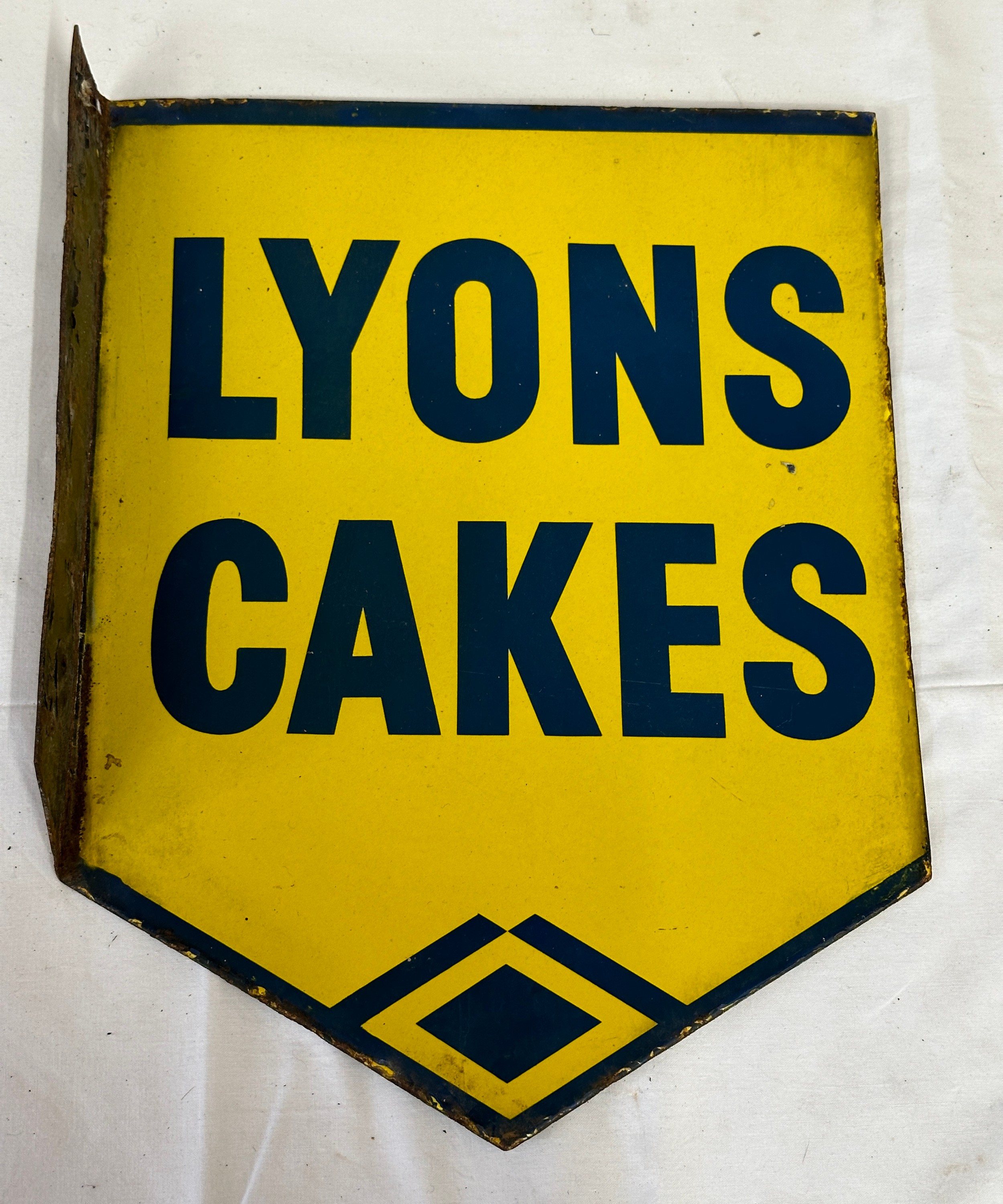 An original double sided Lyons Cakes enamel sign measuring 40 x 30.5cm