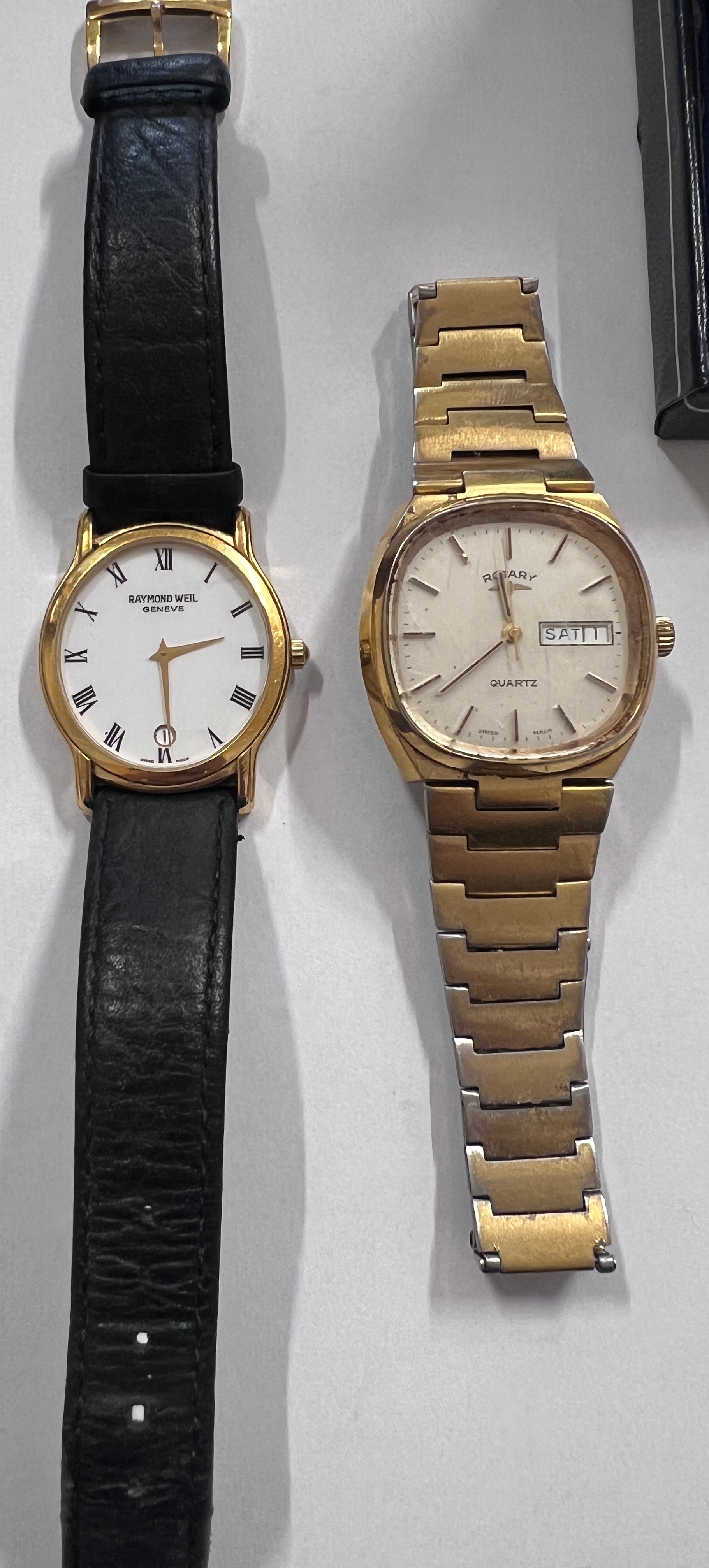 A Raymond Weil watch, 5571 and a Rotary Quartz with date aperture.