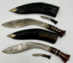 From the estate of Harry Gilbert Shorters M. B. E., A.M.N. Two Gurkha type Kukris with scabbards.