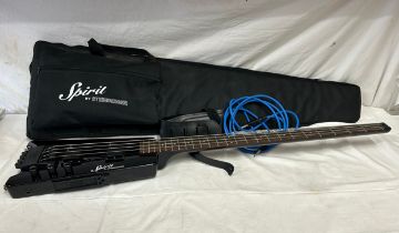 Spirit by Steinberger headless electric guitar with black finish and soft case.