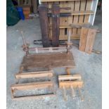 A quantity of vintage wooden and metal book presses.