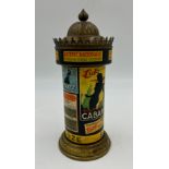 A French 1930's Art Deco brass cigarette dispenser made in the shape of an iconic Moorish style