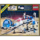 A boxed Lego 6990 Space Monorail and possible track extensions 6921.