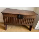 A 17thC oak six plank coffer with linen fold decoration to front. Iron lock. Replacement hinges.