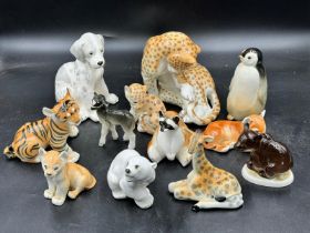Twelve ceramic animal figures stamped `Made in USSR' and two which are unstamped to include a