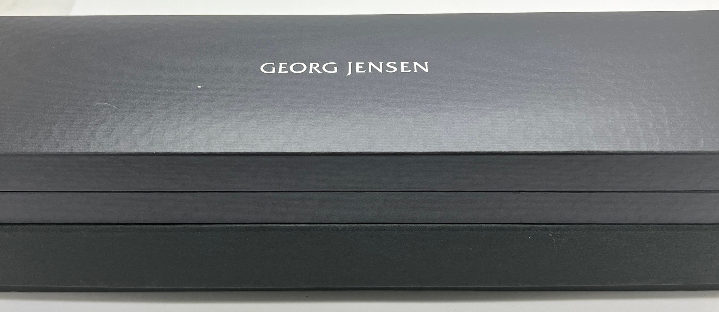 A boxed Georg Jensen Offspring .925 silver and .750 gold bracelet in original presentation box. - Image 3 of 4