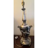 A good quality silver plated table lamp with applied lizard and floral decoration. Height to top