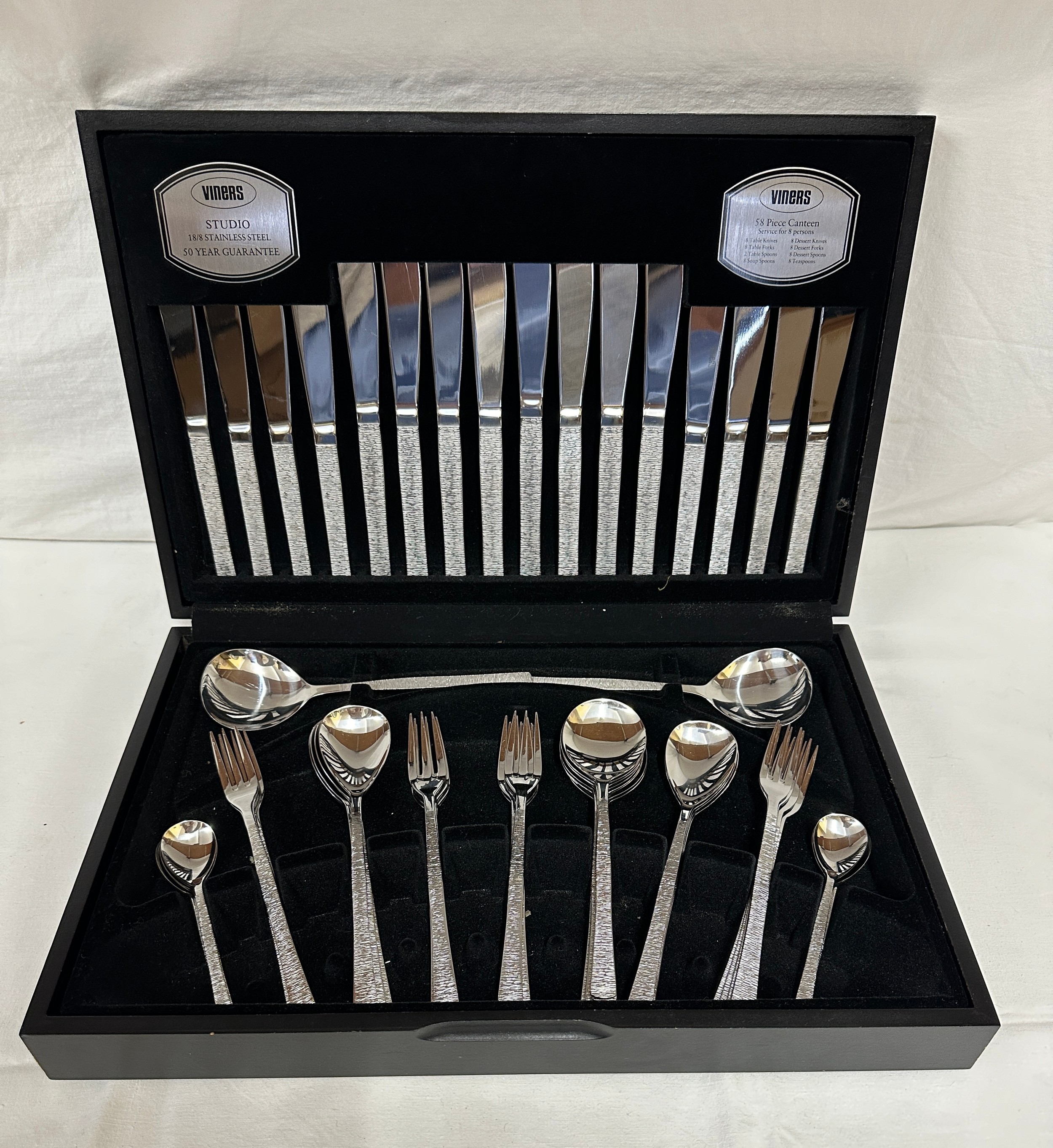 A Viners 8 piece canteen of cutlery by Gerald Benney, missing 1 teaspoon and 1 dessert fork (56).