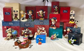 A collection of Disney Showcase figurines (12) to include 'Up on the Rooftop', 'Thinking of you', '