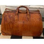 Vintage leather suitcase, 53w x23d x36h.
