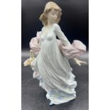 Lladro boxed 5898 ' Spring Splendor ' figure, depicting a young woman holding a basket of flowers,