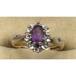 A 9 carat gold amethyst and diamond ring, size L, weight 2.4gm.