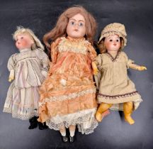 Three bisque headed dolls to include one with the head impressed 'P.R / S.F.B.J. / 60 / PARIS /8/