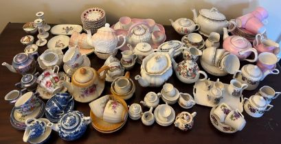 A quantity of late 19thC and early 20thC children’s and doll’s tea services, ribbon plates etc.