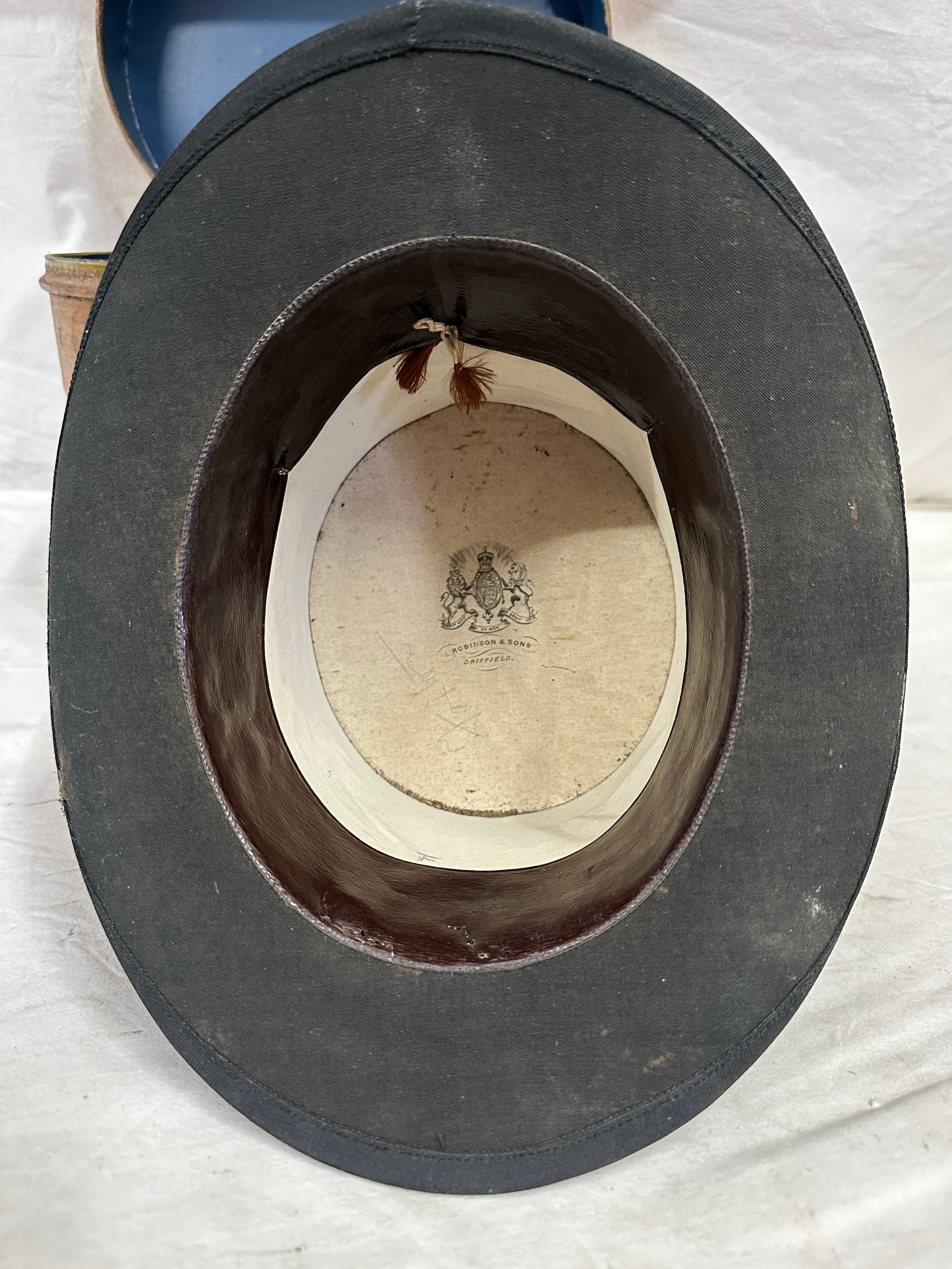 A silk top hat by J Robinson & Sons, Driffield. Approx. circumference 58cm, in a metal hat box. - Image 5 of 6