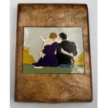 An early 20thC wooden inlaid card/cigarette case depicting courting couple with erotic image to